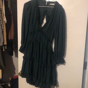 Green open back dress